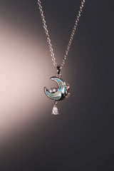 Collier lune et rose à pierre bleue