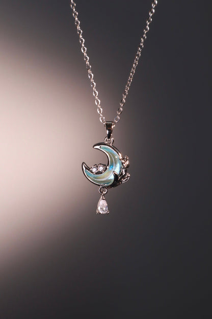 Collier lune et rose à pierre bleue