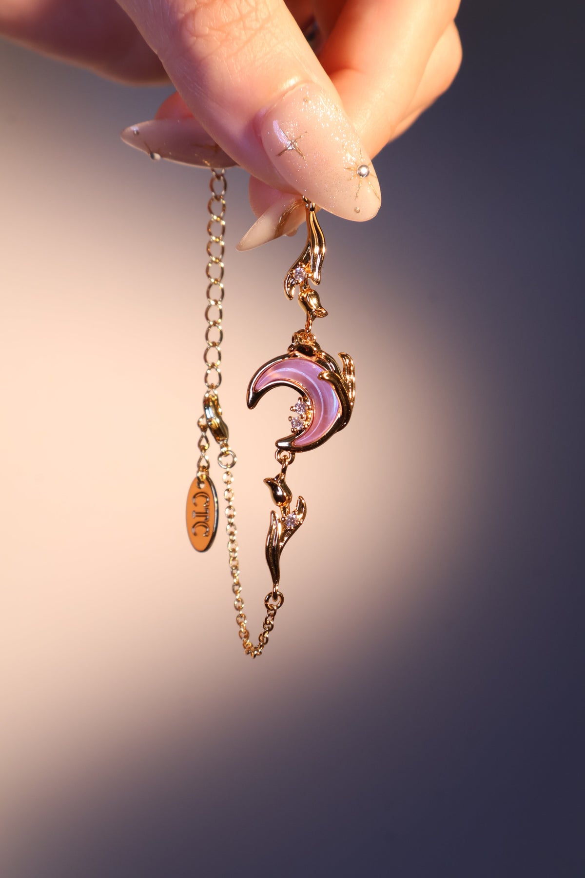 Bracelet lune et rose scintillant, plaqué or 18 carats