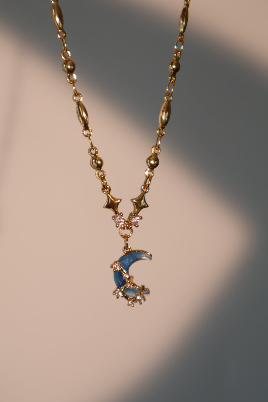 Collier lune et étoile, plaqué or 18 carats
