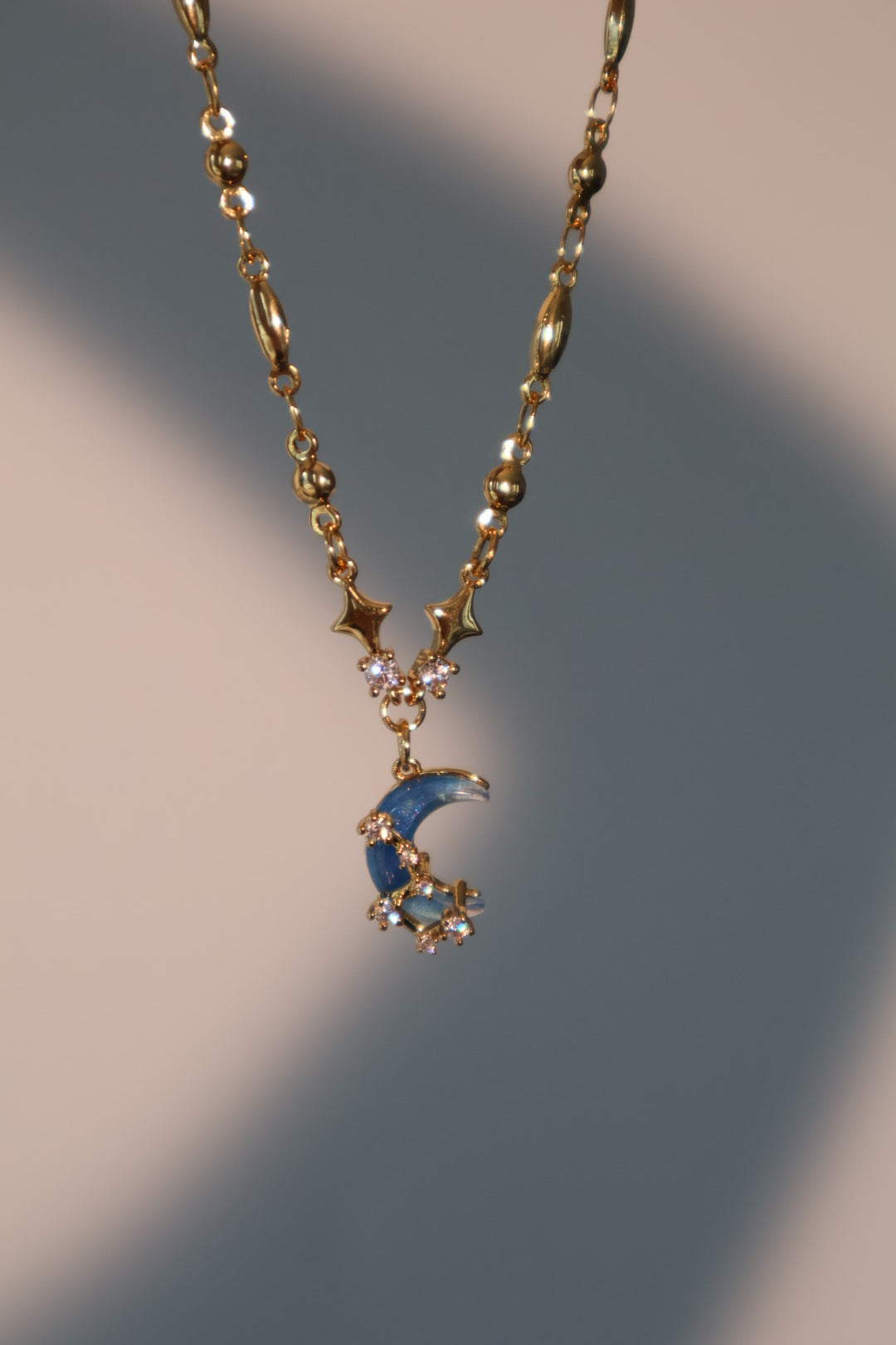 Collier lune et étoile, plaqué or 18 carats