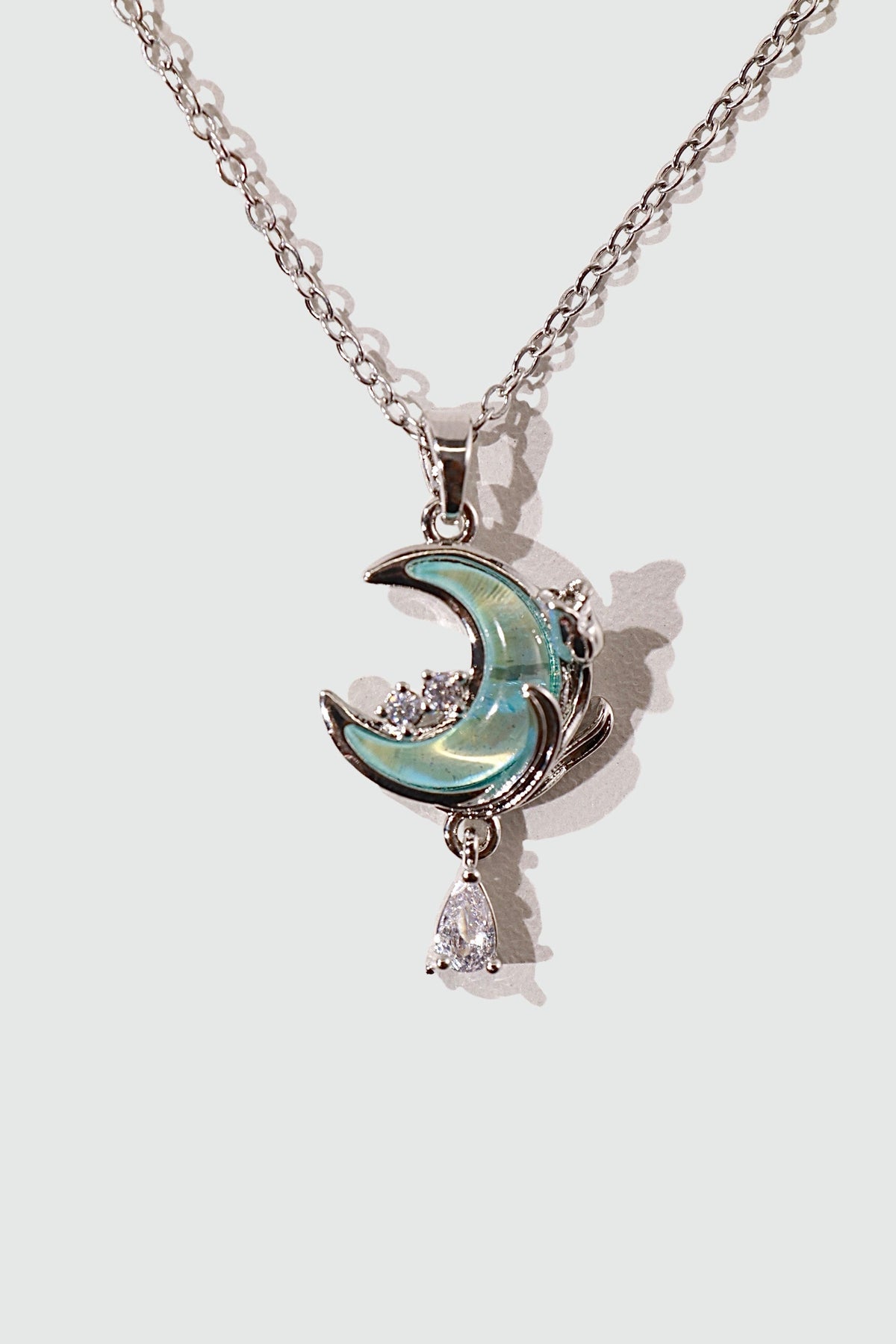 Collier lune et rose à pierre bleue