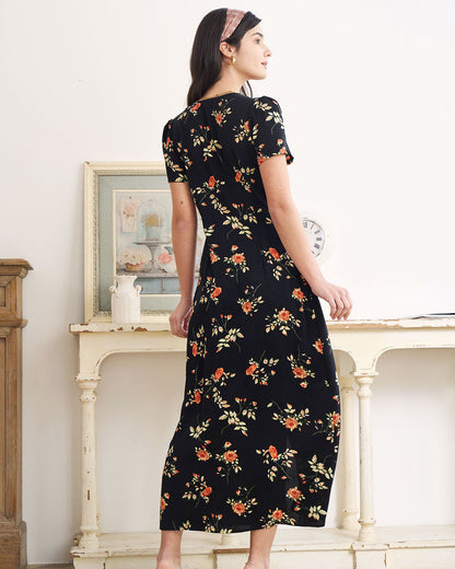 Robe longue noire fleurie à col V et manches courtes