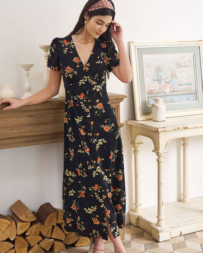 Robe longue noire fleurie à col V et manches courtes